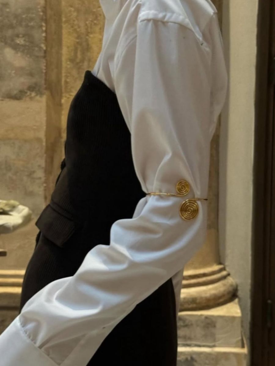 Anni Lu - Spiral Upper Arm Cuff styled over white shirt