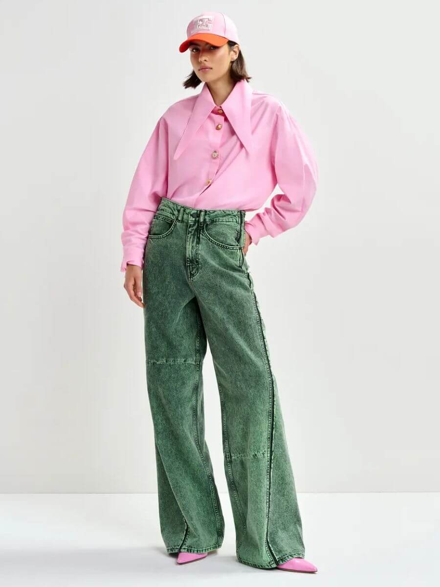 Essentiel Antwerp Jomato Shirt in Cotton Candy pink syled with pink/orange baseball cap, grey wide leg jeans and patent pink pointed toe flats