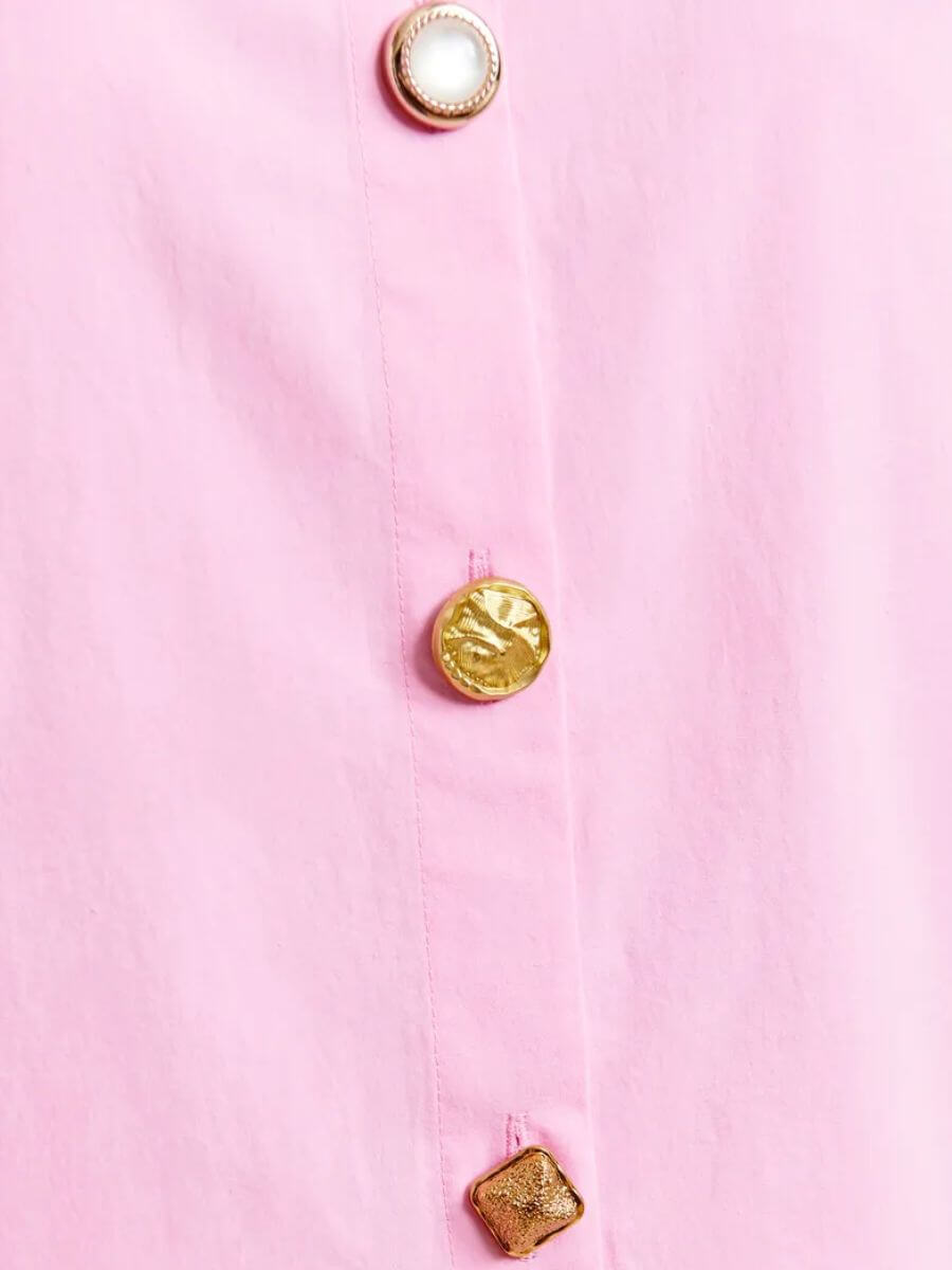 Essentiel Antwerp Jomato Shirt in Cotton Candy pink zoom in on button detail - mixed gold buttons - with pearl centre, scultptural top, square textured