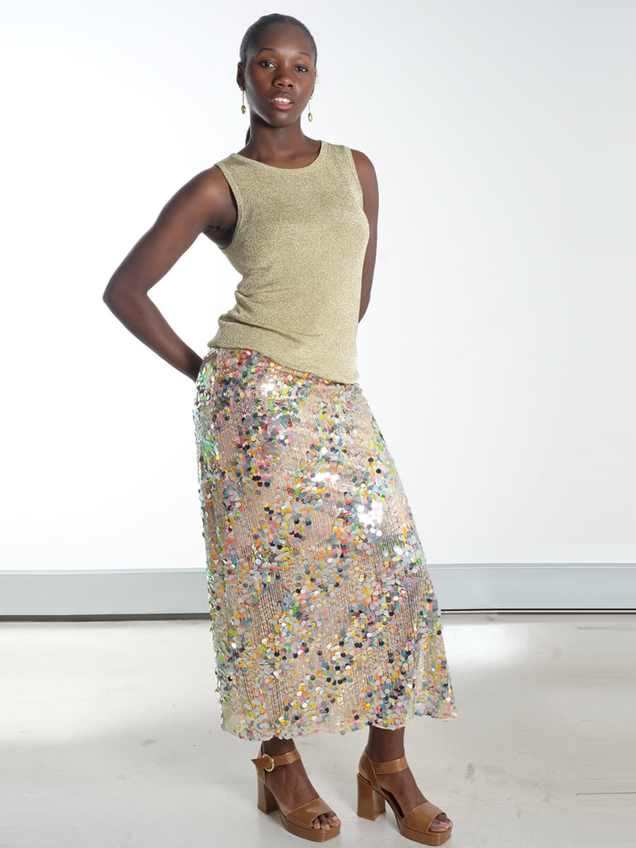 Hunkon - Blaze Sequin Skirt
Munthe - Parli Cardigan - Gold
Munthe - Parkster Knit - Gold