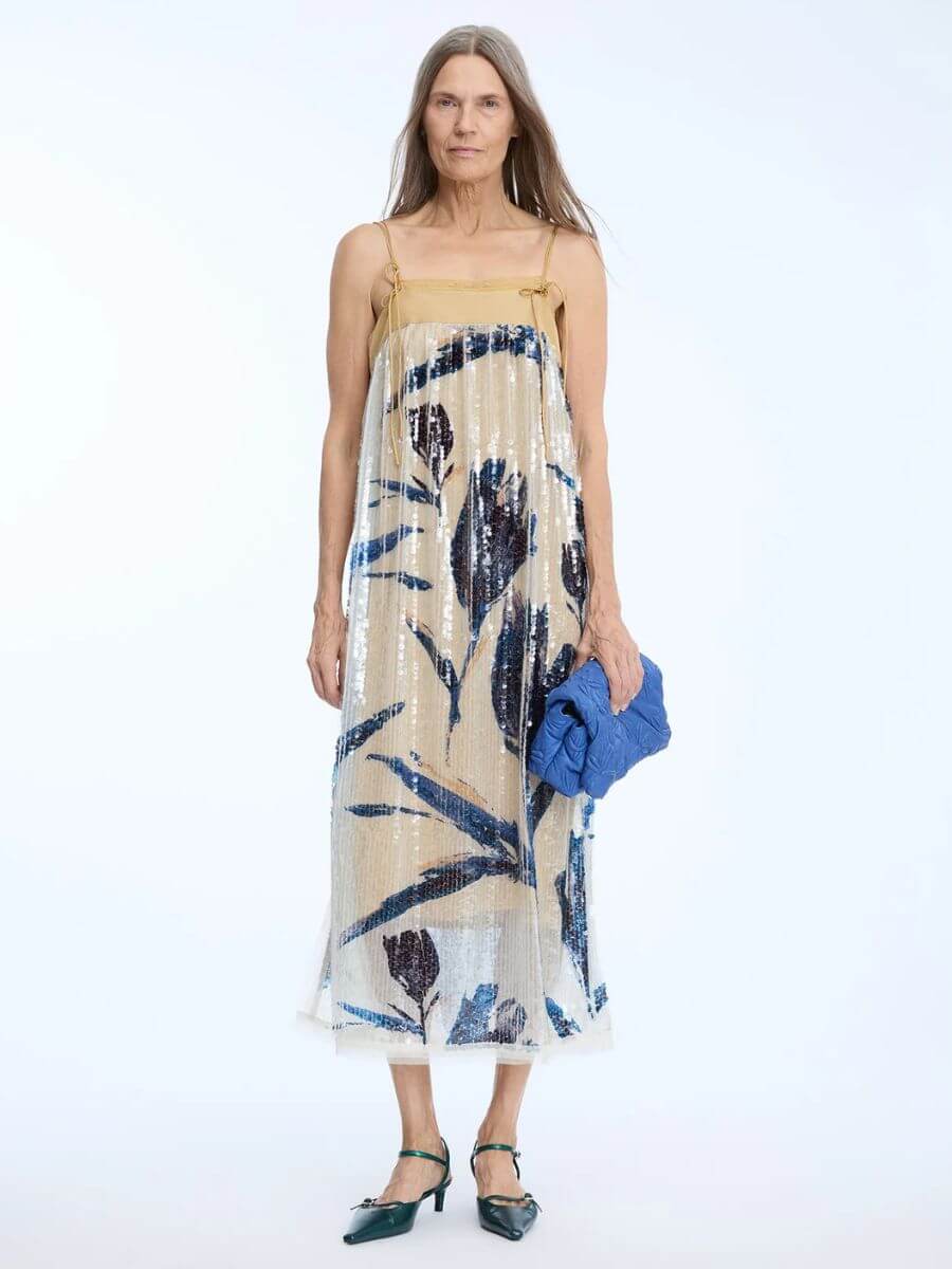 Munthe - Nara Dress - Print Kit styled over slip with patent petrol coloured pointed toe heels and textured blue leather clutch bag