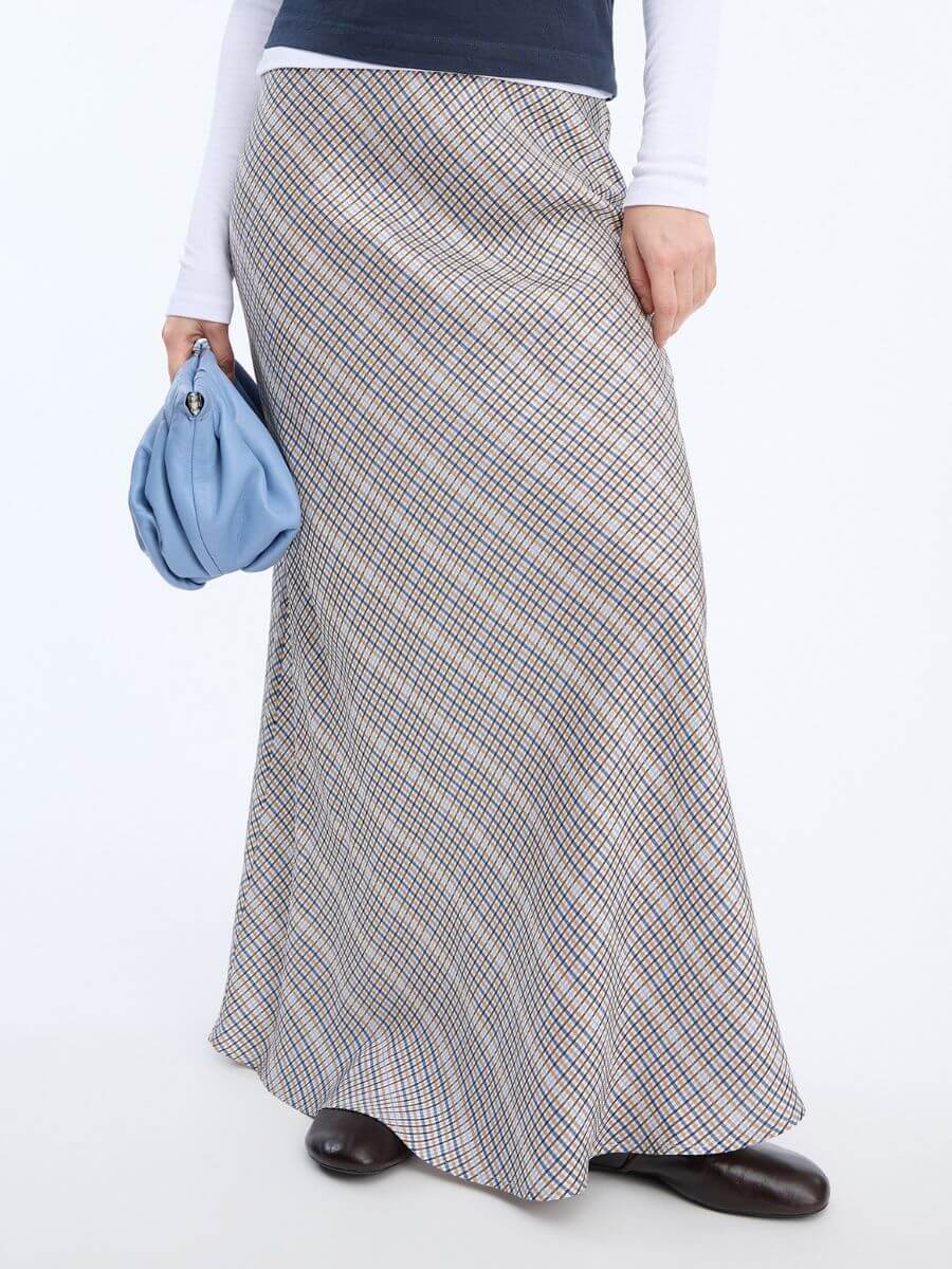 Munthe Bardot Skirt styled with leather flats and layered long and short sleeve tees in navy and white with light blue leather clutch bag