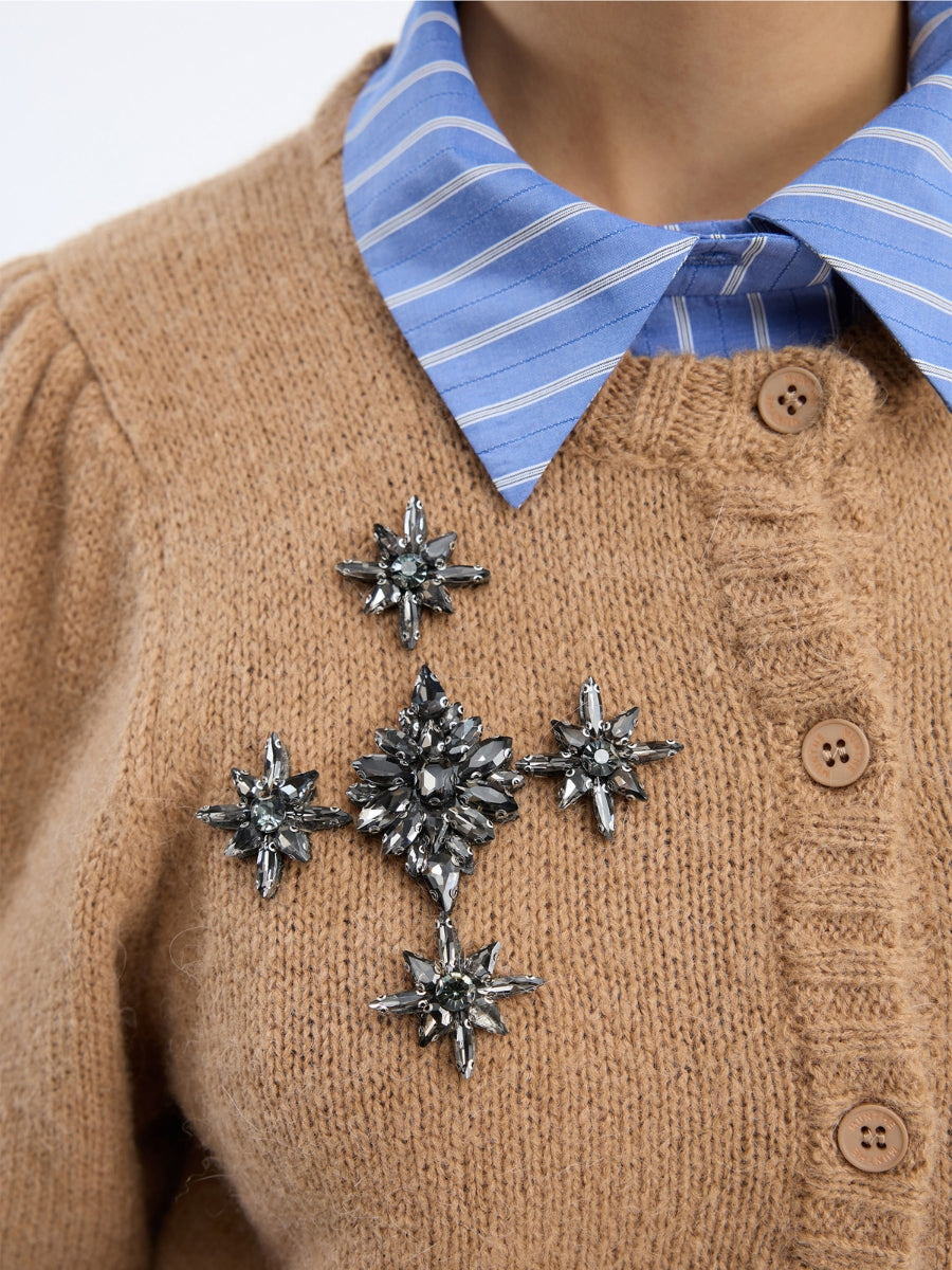 Munthe Vocca Cardigan close up of left chest showing diamante beads forming a motif of a diamond with a star at each point