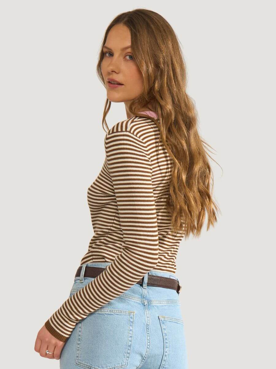 Numph - Filina Pullover - Dachshund. Brown/cream stripe with pink contrast neck. Styled with light wash Mom jeans and brown belt.