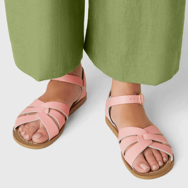 Salt Water Sandals in light pink worn with sage trousers