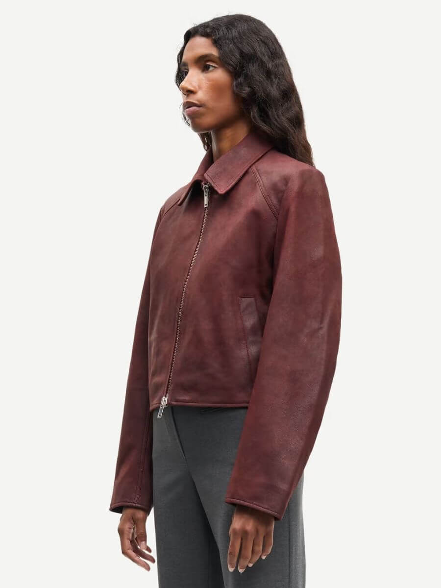 Samsoe Samsoe - Sashiva Leather Jacket - Fudge side view zipped up with charcoal tailored trousers
