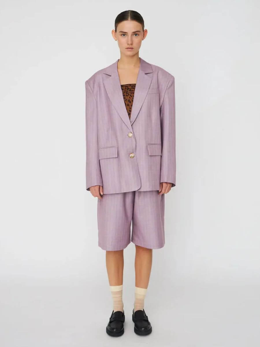Stella Nova - Striped Oversized Blazer - Light Purple hands out of pockets showing off dropped shoulder and long sleeve length