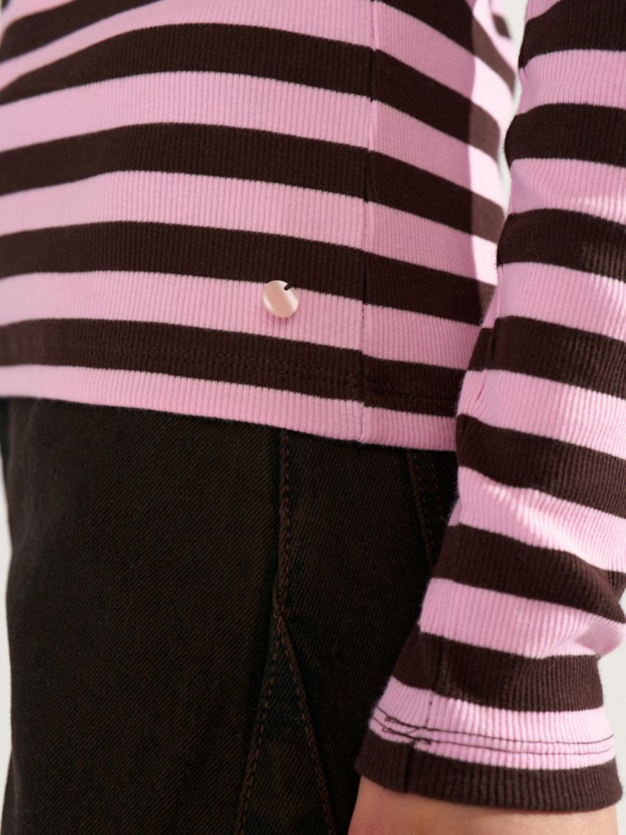 Numph - Mixie LS T-Shirt showing decorative button at left hip near side seam