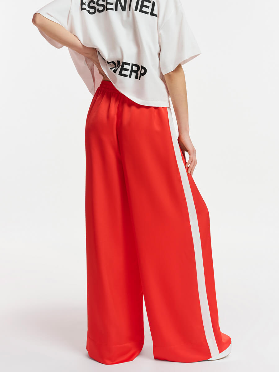 Essentiel Antwerp Freedive Pants red with white side stripe