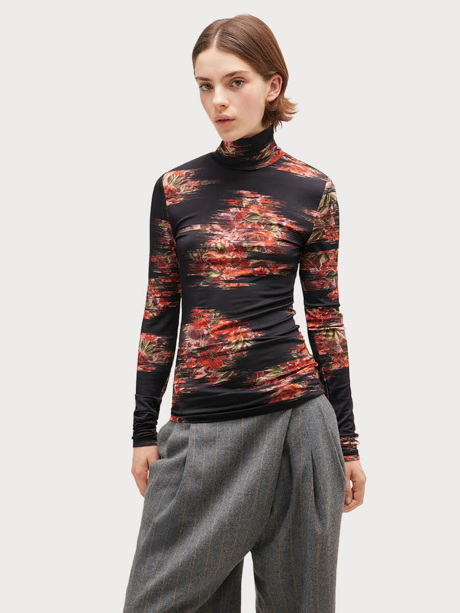 GANNI
Printed Shiny Jersey Turtleneck