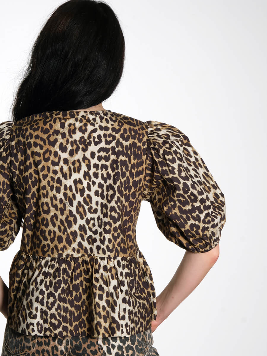 Ganni - Leopard Cotton Poplin Peplum Tie Blouse
