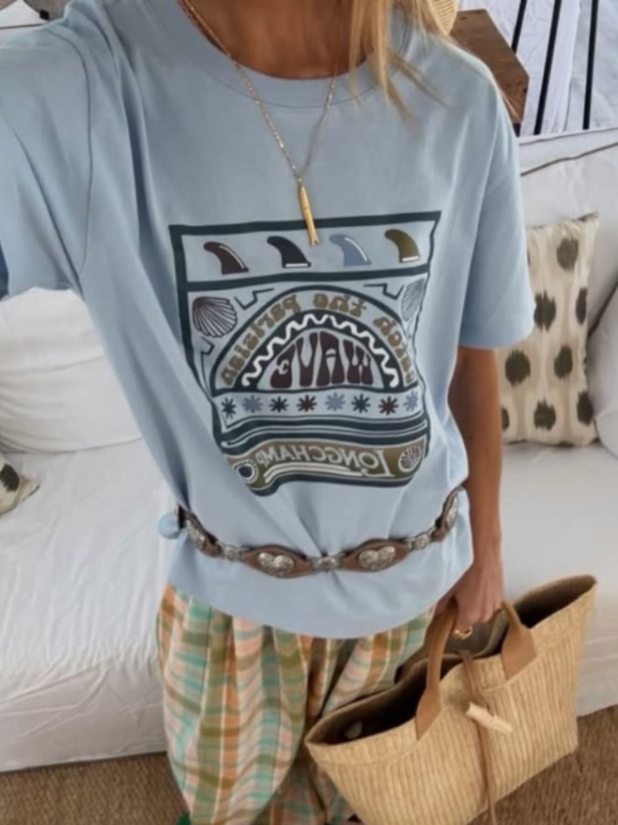 Anni Lu - Hippie Fish Necklace styled with graphic tee, loose fit trousers and beach handbag