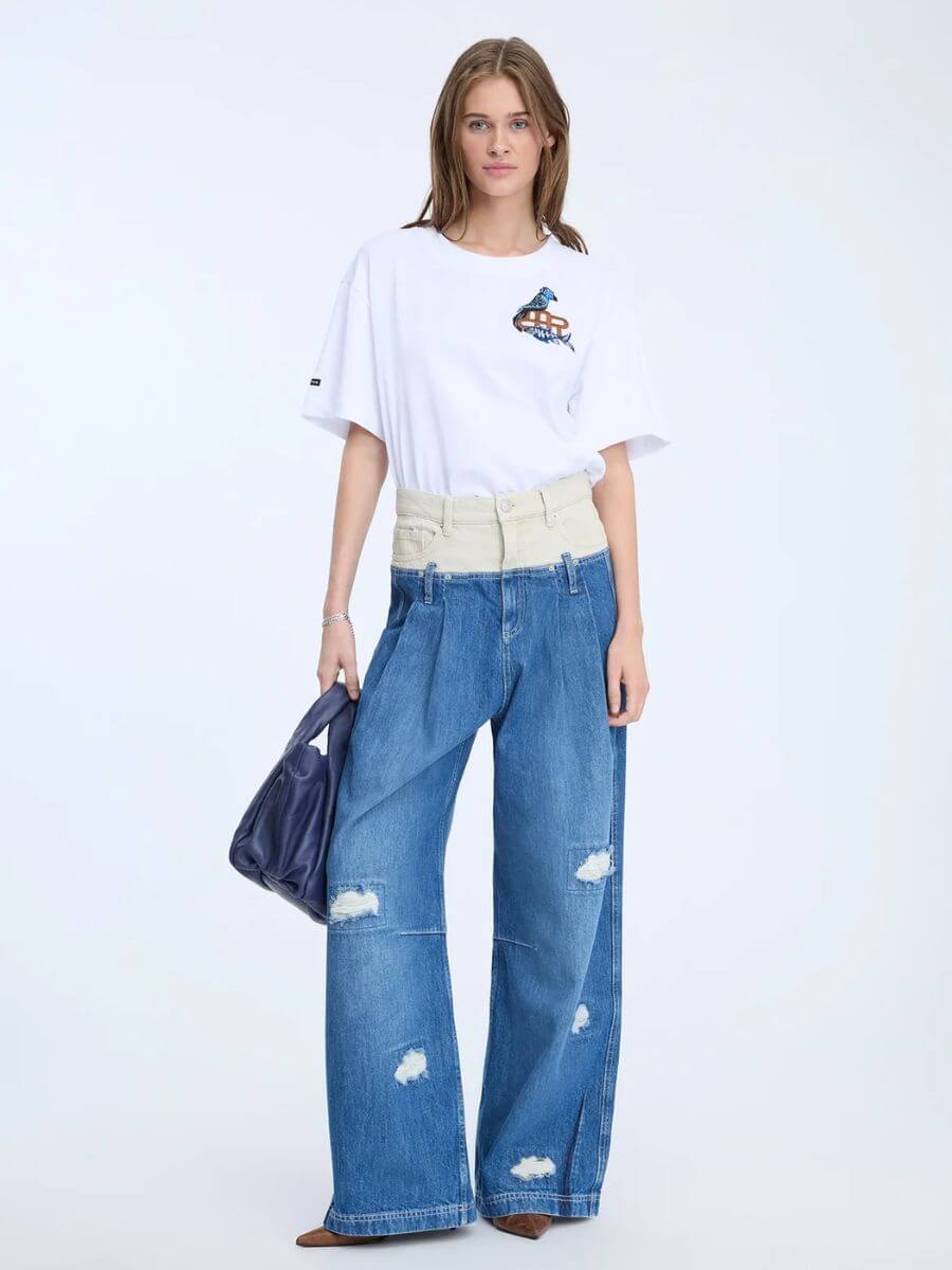 Munthe - Nuri T-Shirt styled with wide leg mid-blue jeans with cream wasitband and slouchy navy leather bag and brown suede pointed toe kitten heels