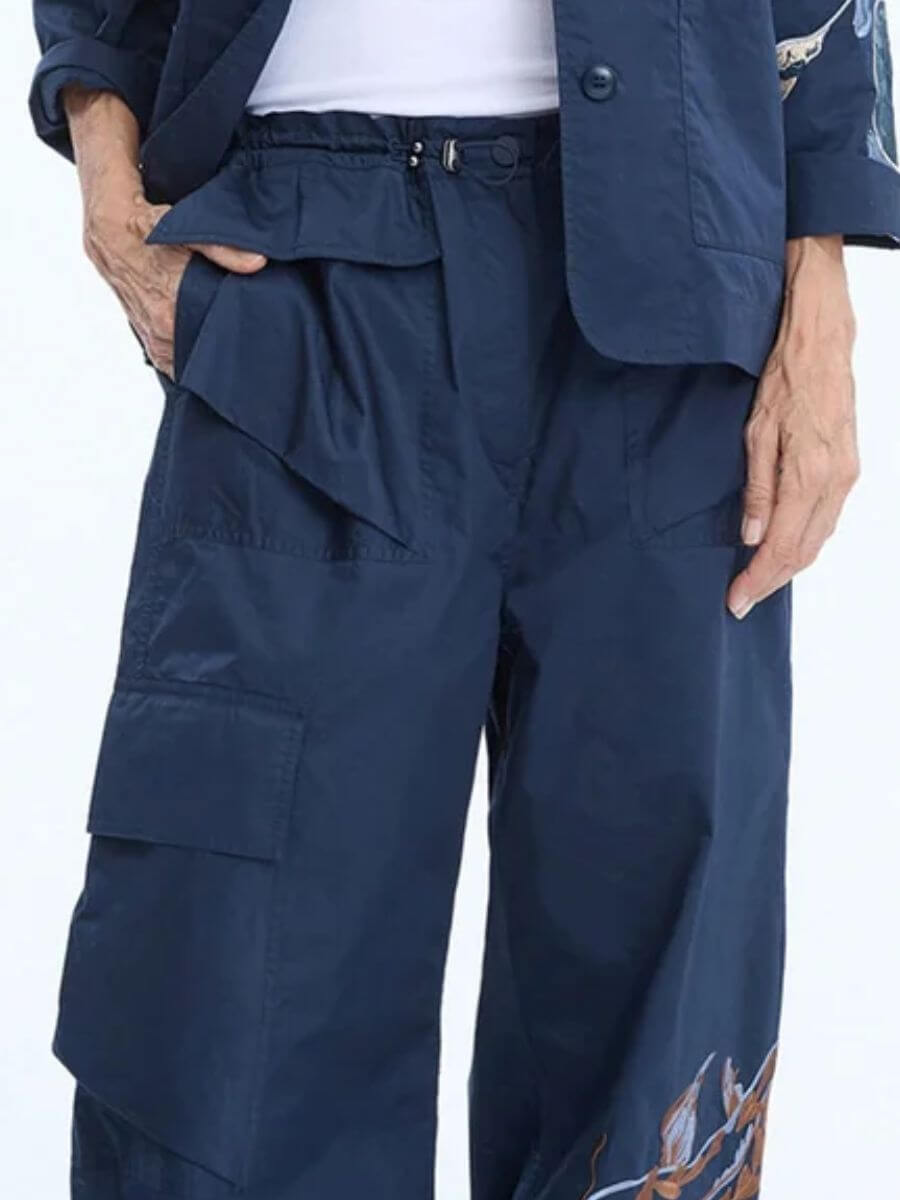 Munthe - Unform Pants - Navy zoom in on front frill pocket detail and waistband drawcord 