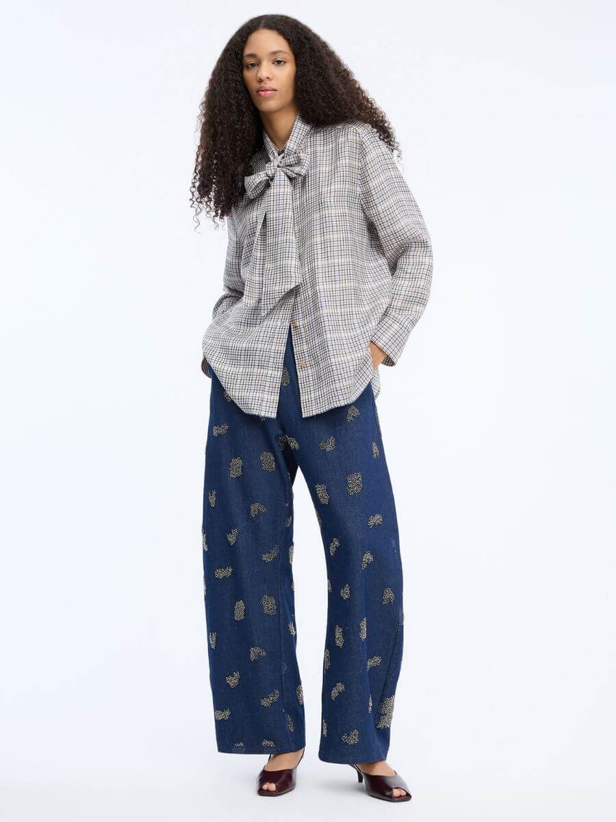 Munthe Veiling Shirt styled untucked with barrel leg jeans and peep toe patent heels