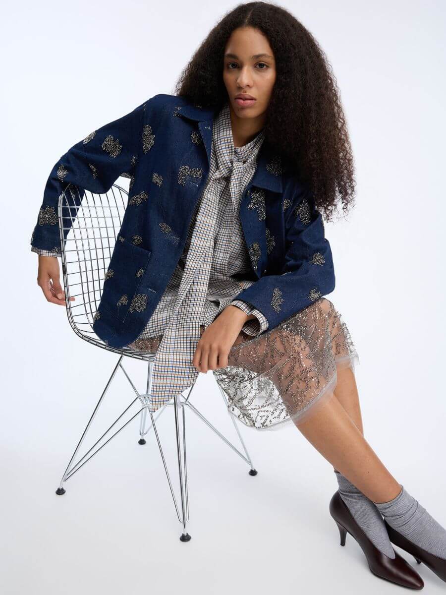 Munthe Veiling Shirt styled with denim jacket, sheer sequin skirt, glitter socks and heels