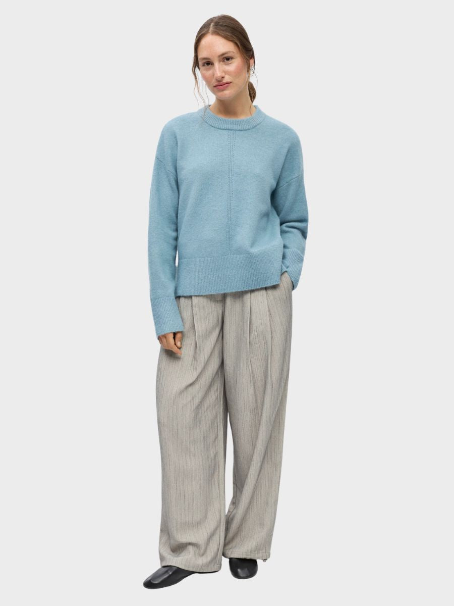 Object - Juno Pullover - Blue Shadow Melange styled with light grey tailored wide leg trousers and black leather flats
