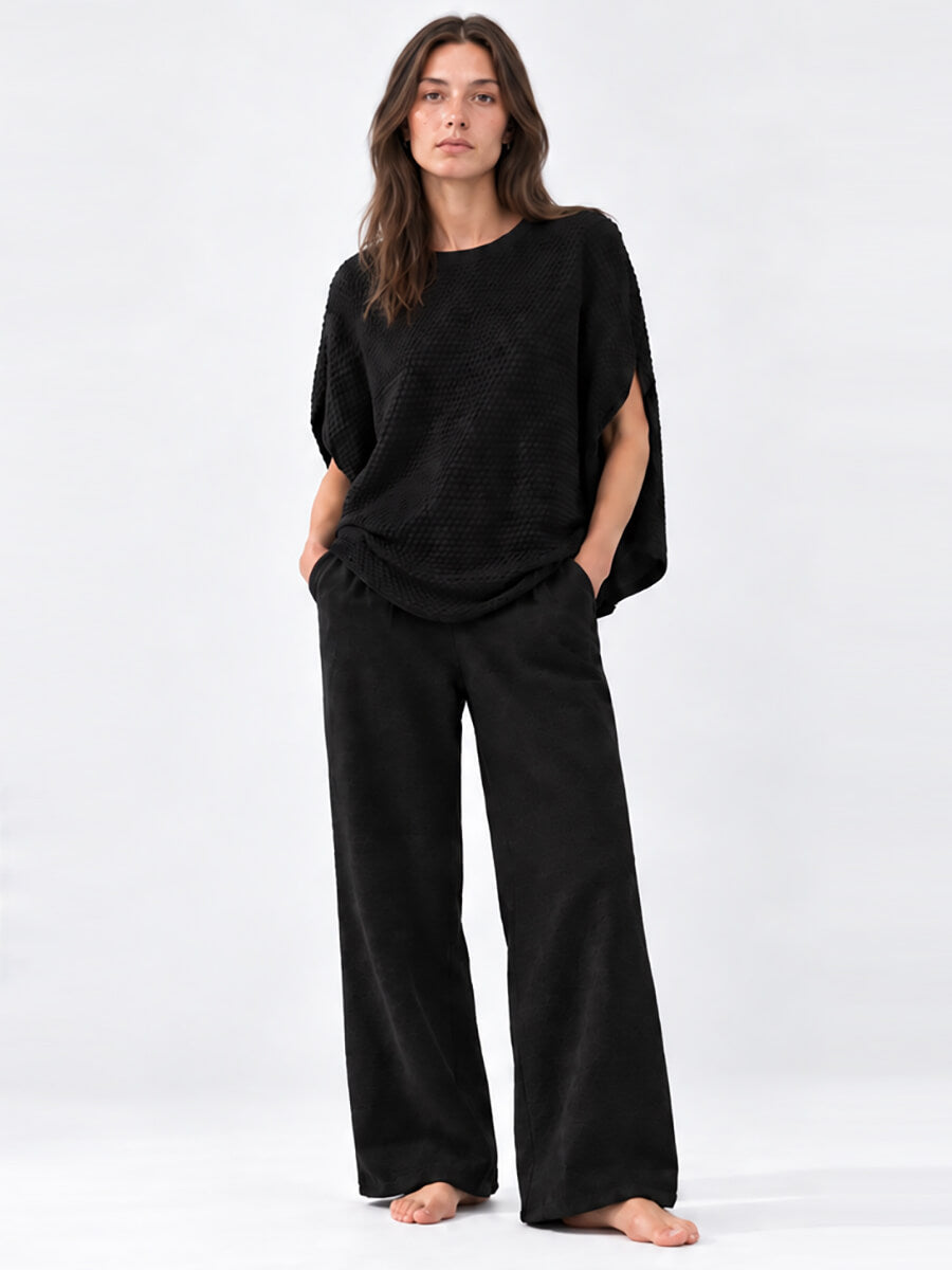 SIBIN LINNEBJERG
Adi Poncho - Black
