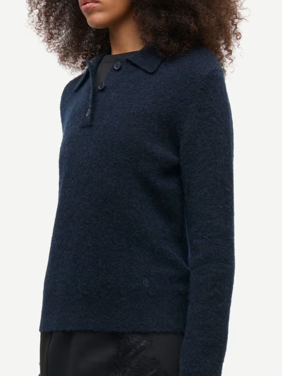 Samsoe Samsoe - Sanoura LS Polo side view close up showing subtle navy embroidered logo at hip