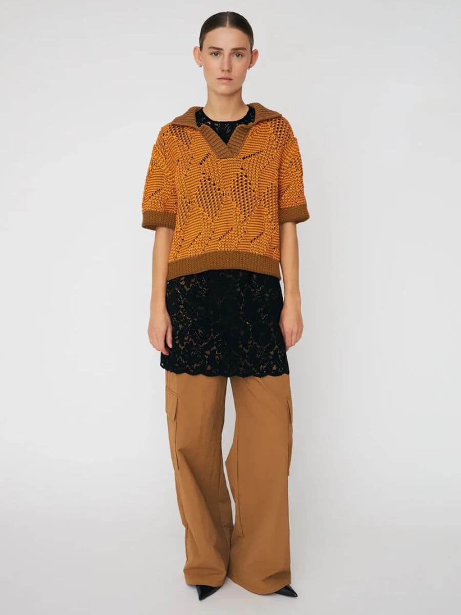 Stella Nova - Cotton Knit Polo - Burned Orange styled over long black crotchet top and brown cargo pants with pointed toe shoes