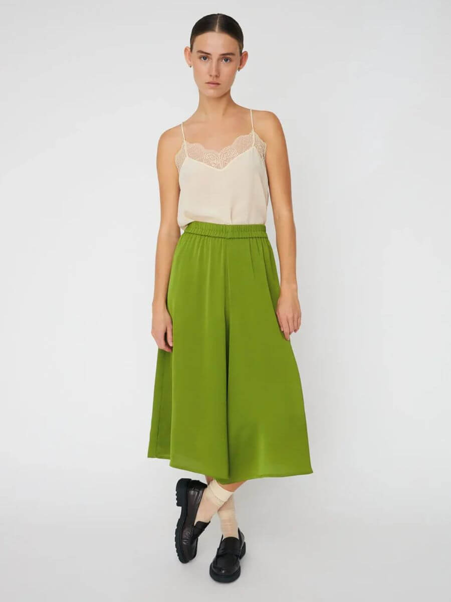 Stella Nova - Delicate Shorts - Green Flash styled with Delicate Lace Top in cream, black loafers and cream ankle socks